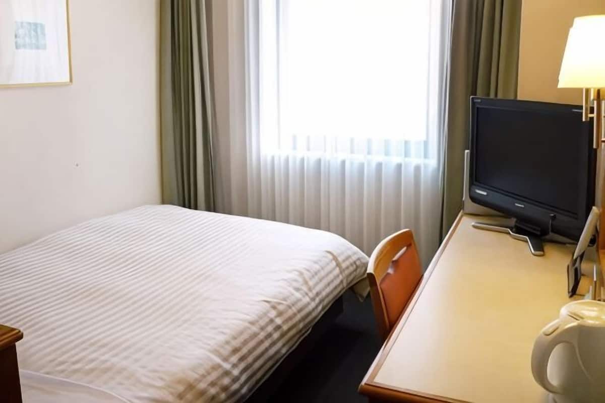 Desk, blackout drapes, iron/ironing board, free WiFi