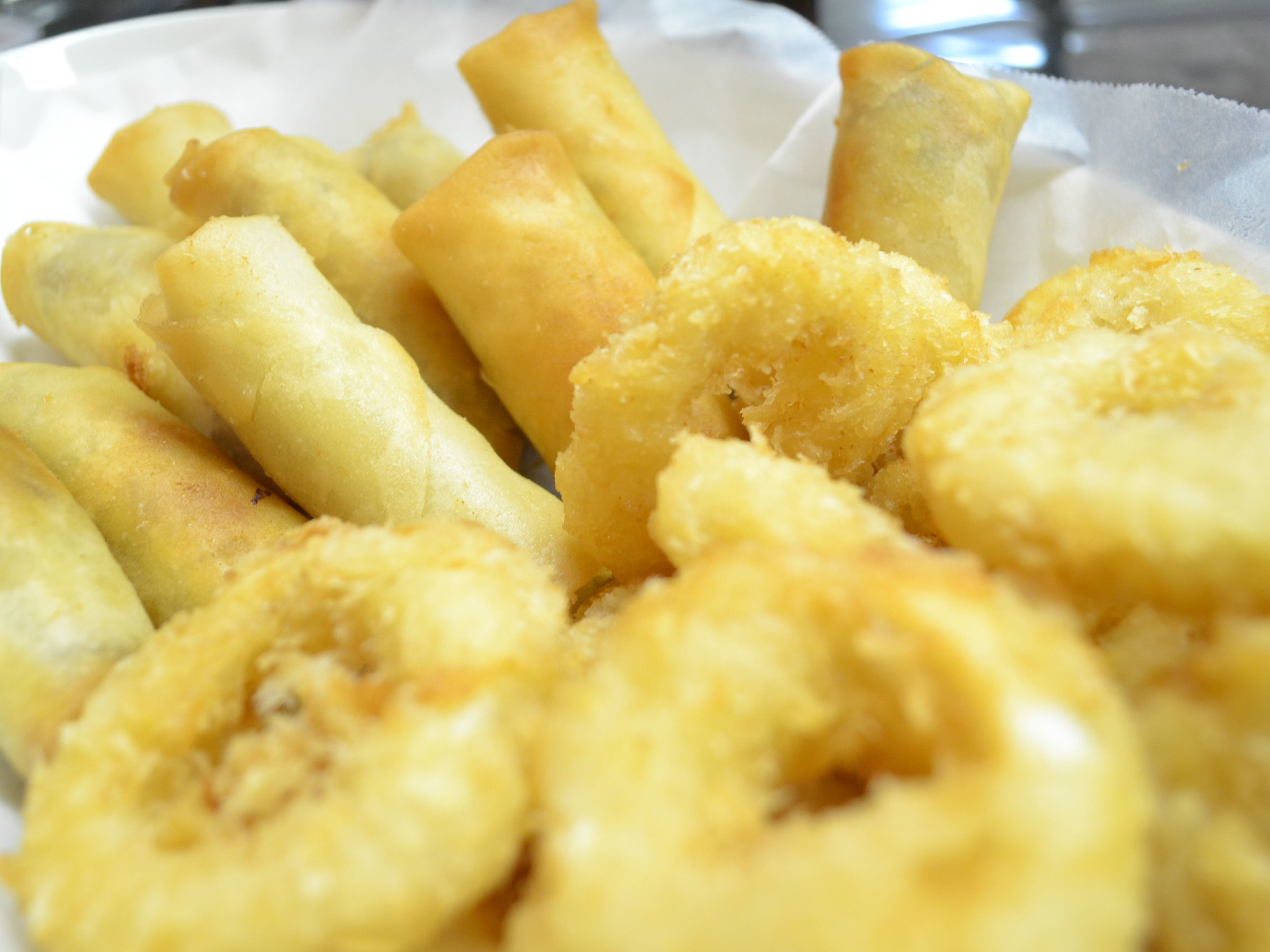 A plate of fried spring rolls.