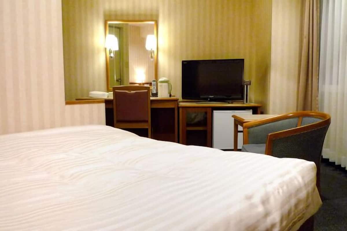 Desk, blackout drapes, iron/ironing board, free WiFi