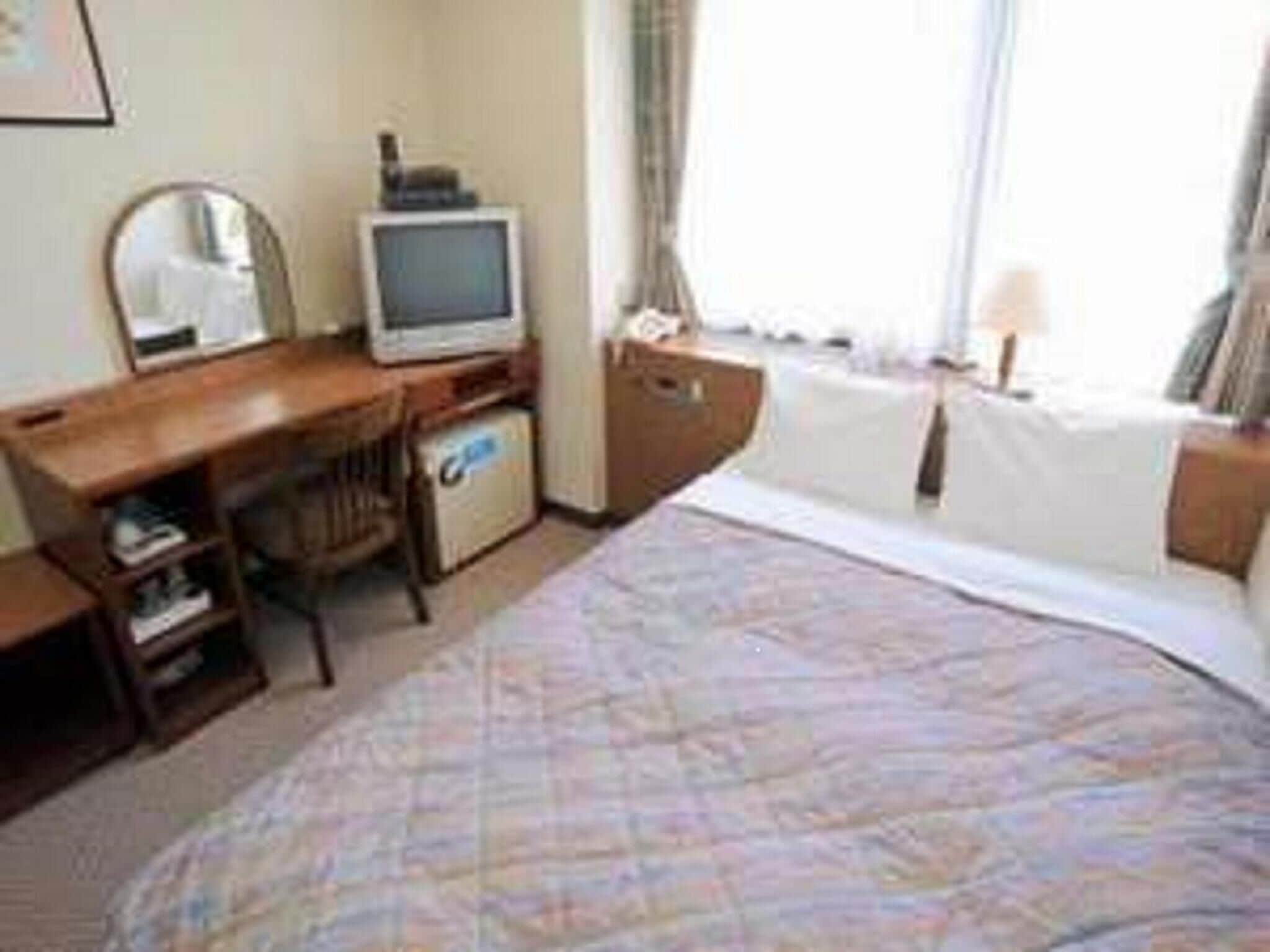 desk, blackout curtains, iron/ironing board, free wifi