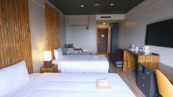 Habitación Deluxe con 2 camas individuales | Ropa de cama de alta calidad, caja fuerte, ropa de cama