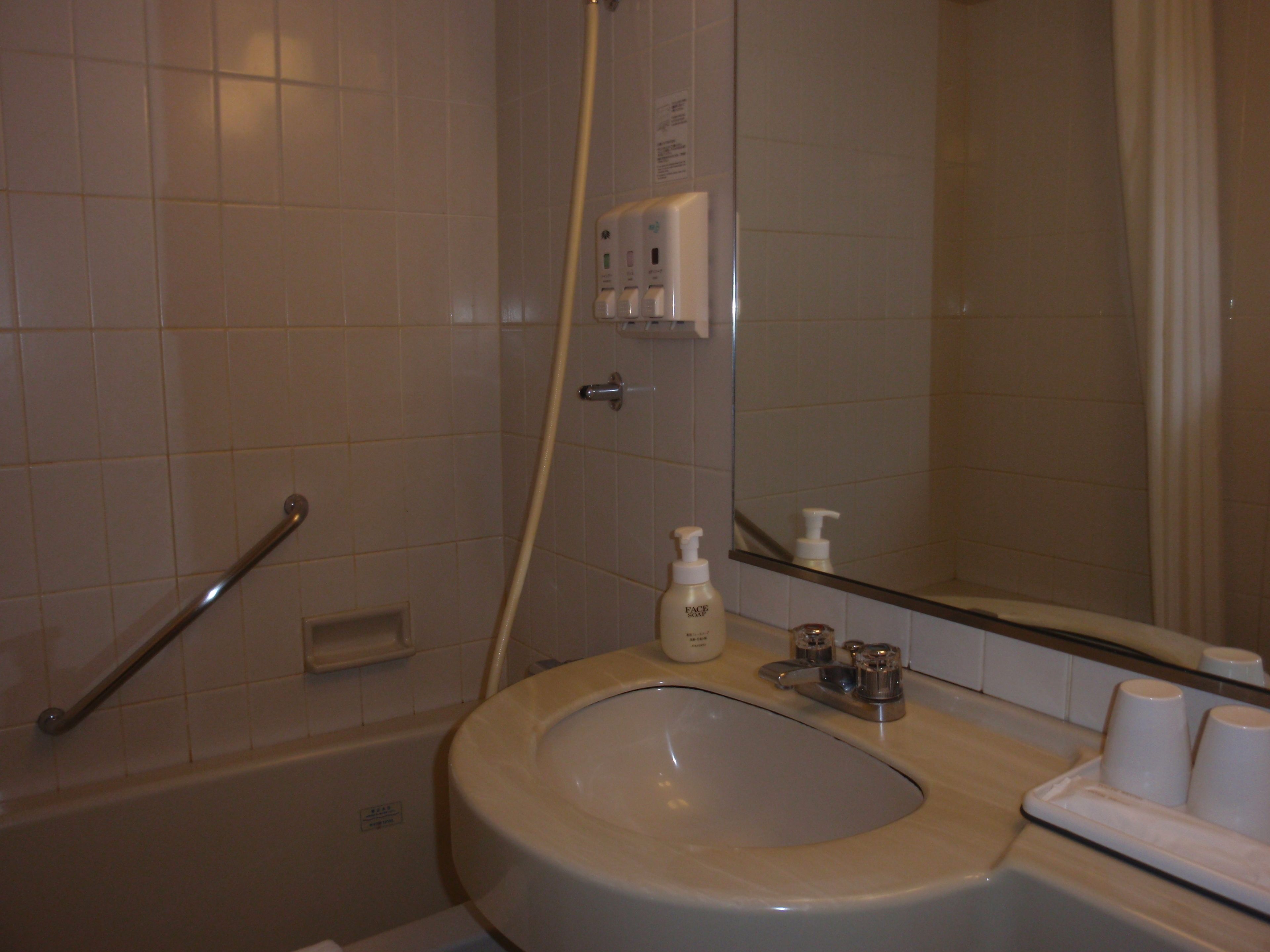 twin room | bathroom | combined shower/bathtub, hair dryer, slippers, electronic bidet