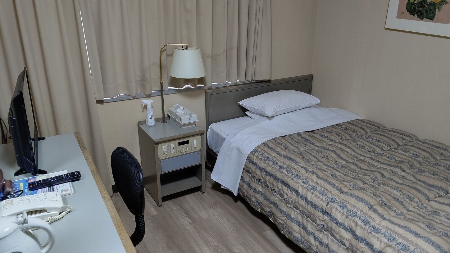 Desk, free WiFi, bed sheets