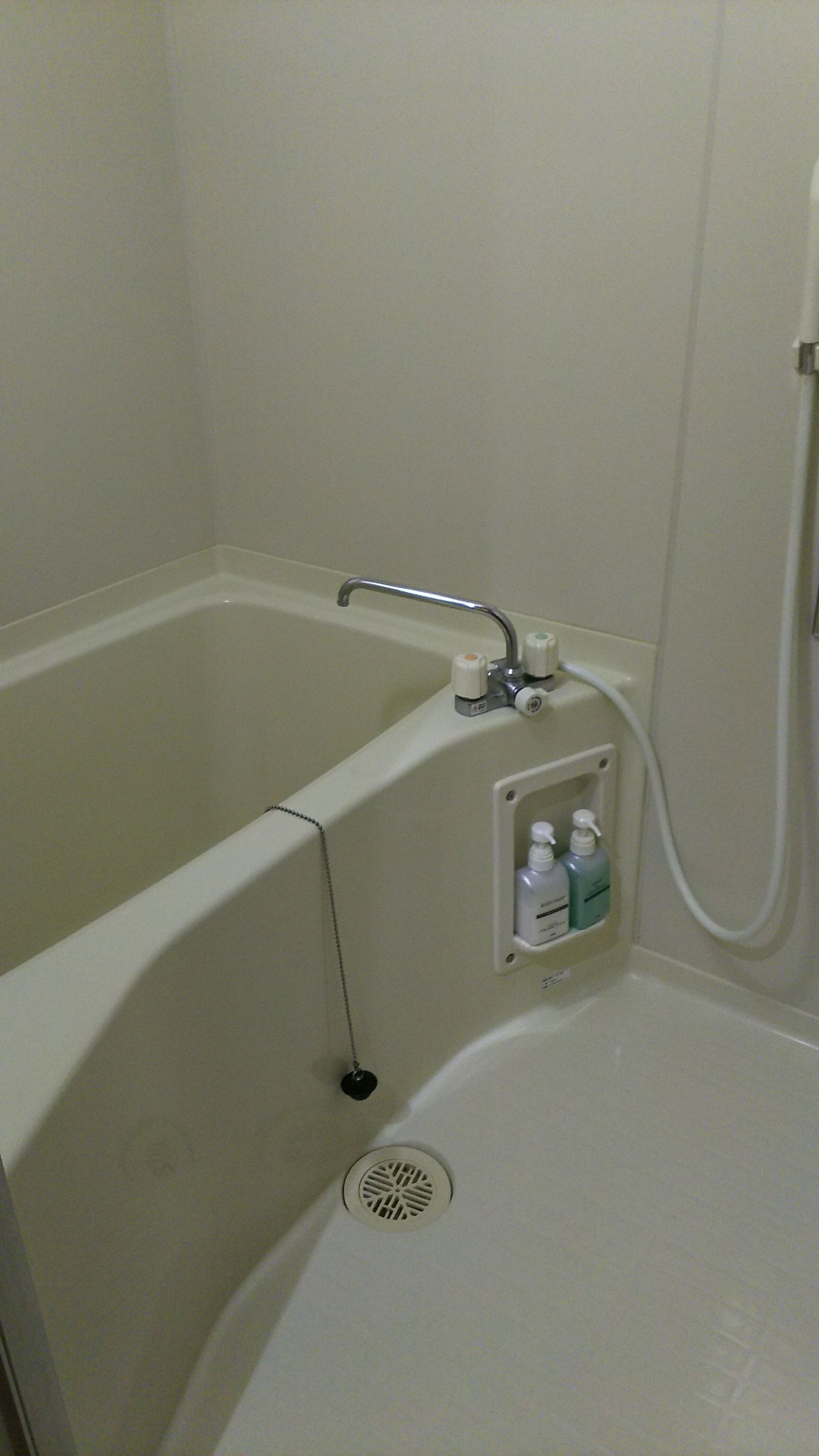 Luxury Room, Smoking (1 double bed + 2 futons) | Bathroom | Rainfall showerhead, free toiletries, hair dryer, slippers