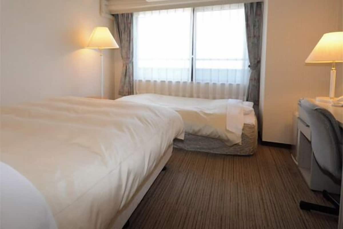 In-room safe, desk, WiFi (free), bed sheets