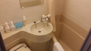 Combined shower/bathtub, free toiletries, hair dryer, bathrobes
