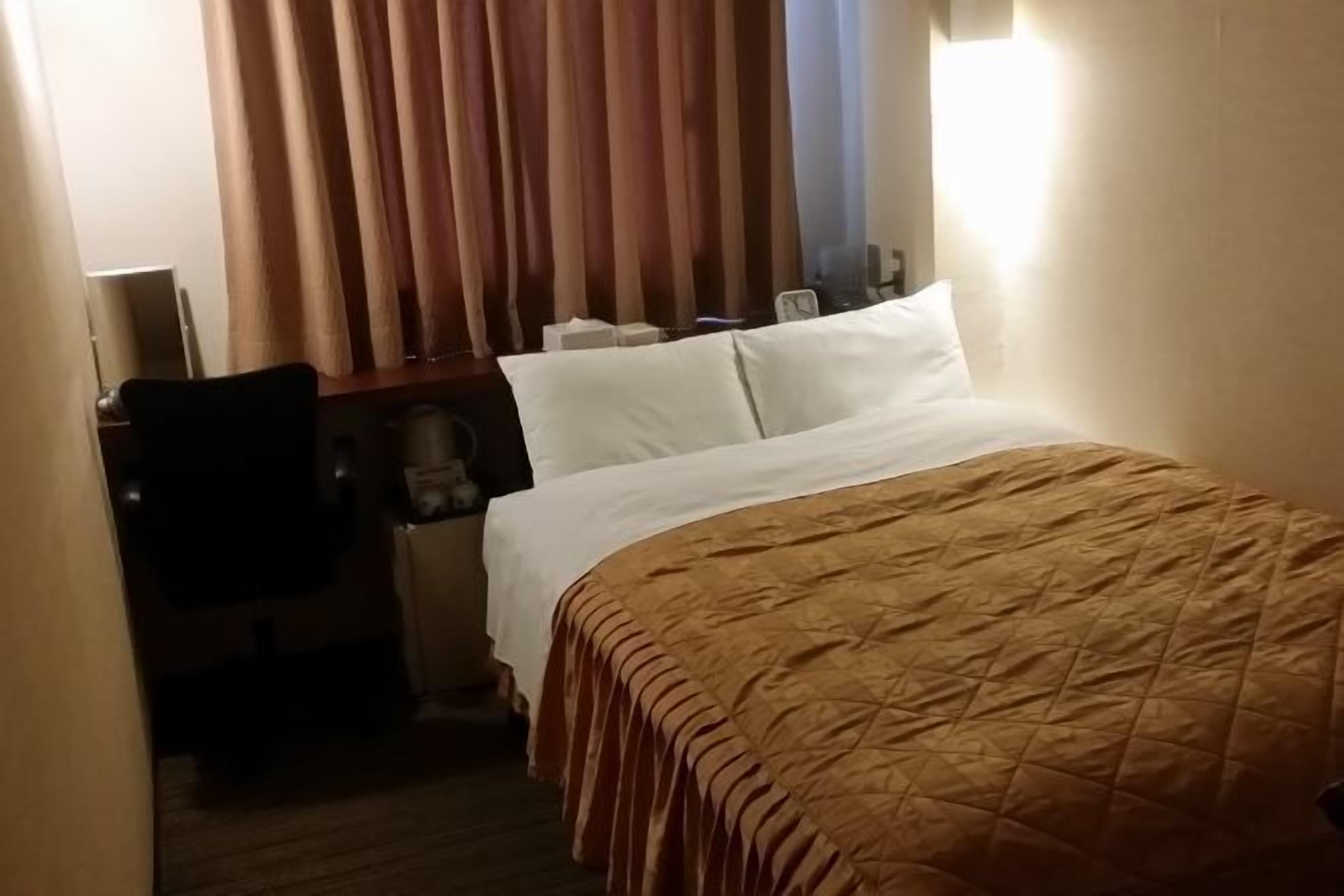 Down duvets, desk, blackout curtains, iron/ironing board