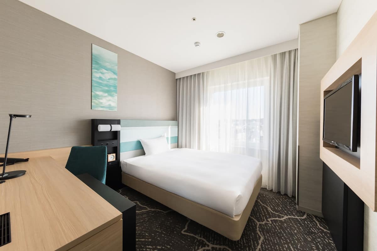 premium bedding, desk, blackout curtains, iron/ironing board