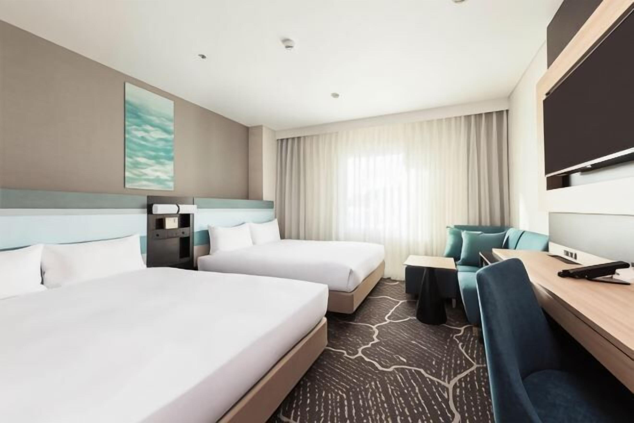 Premium bedding, desk, blackout drapes, iron/ironing board