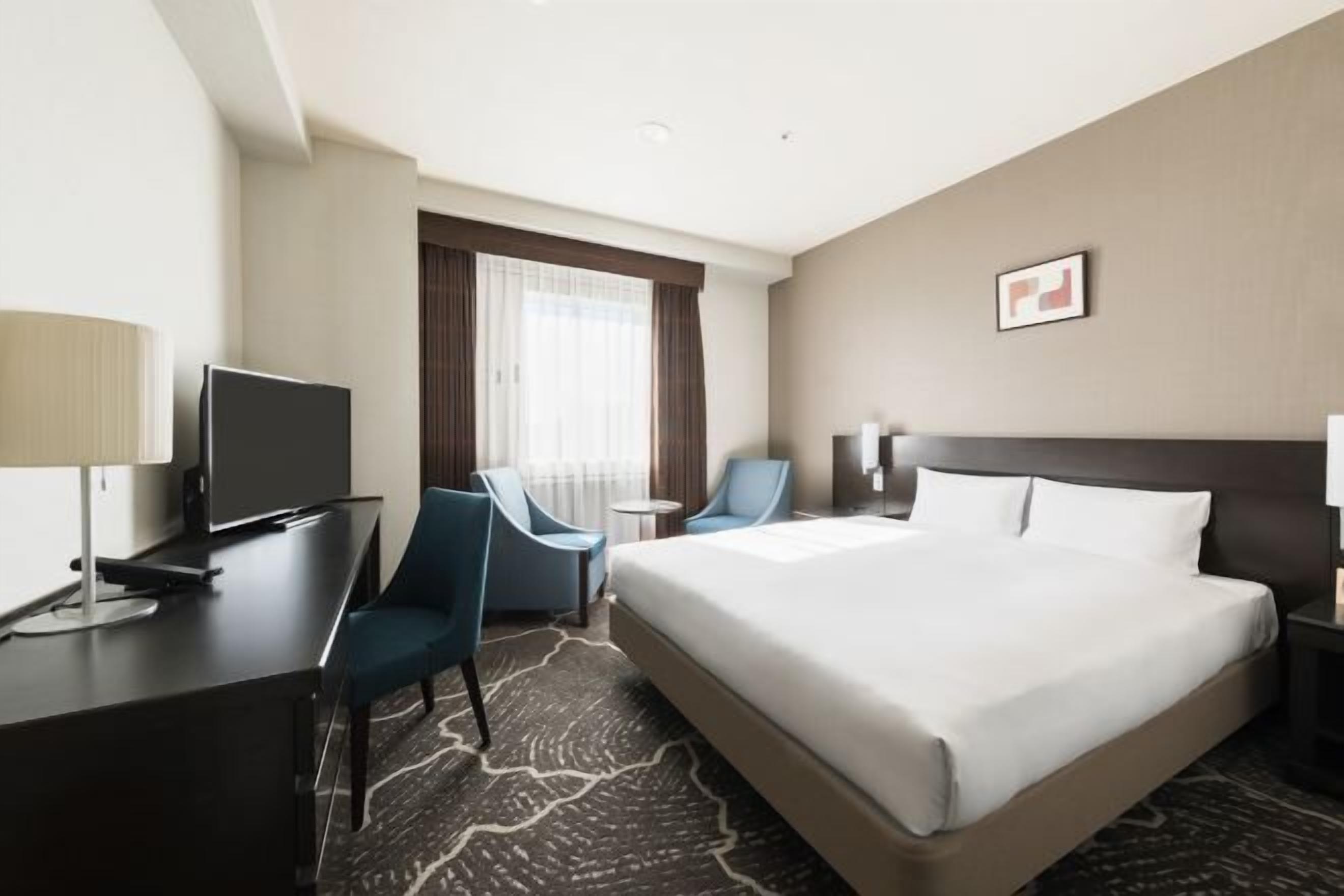 Premium bedding, desk, blackout drapes, iron/ironing board