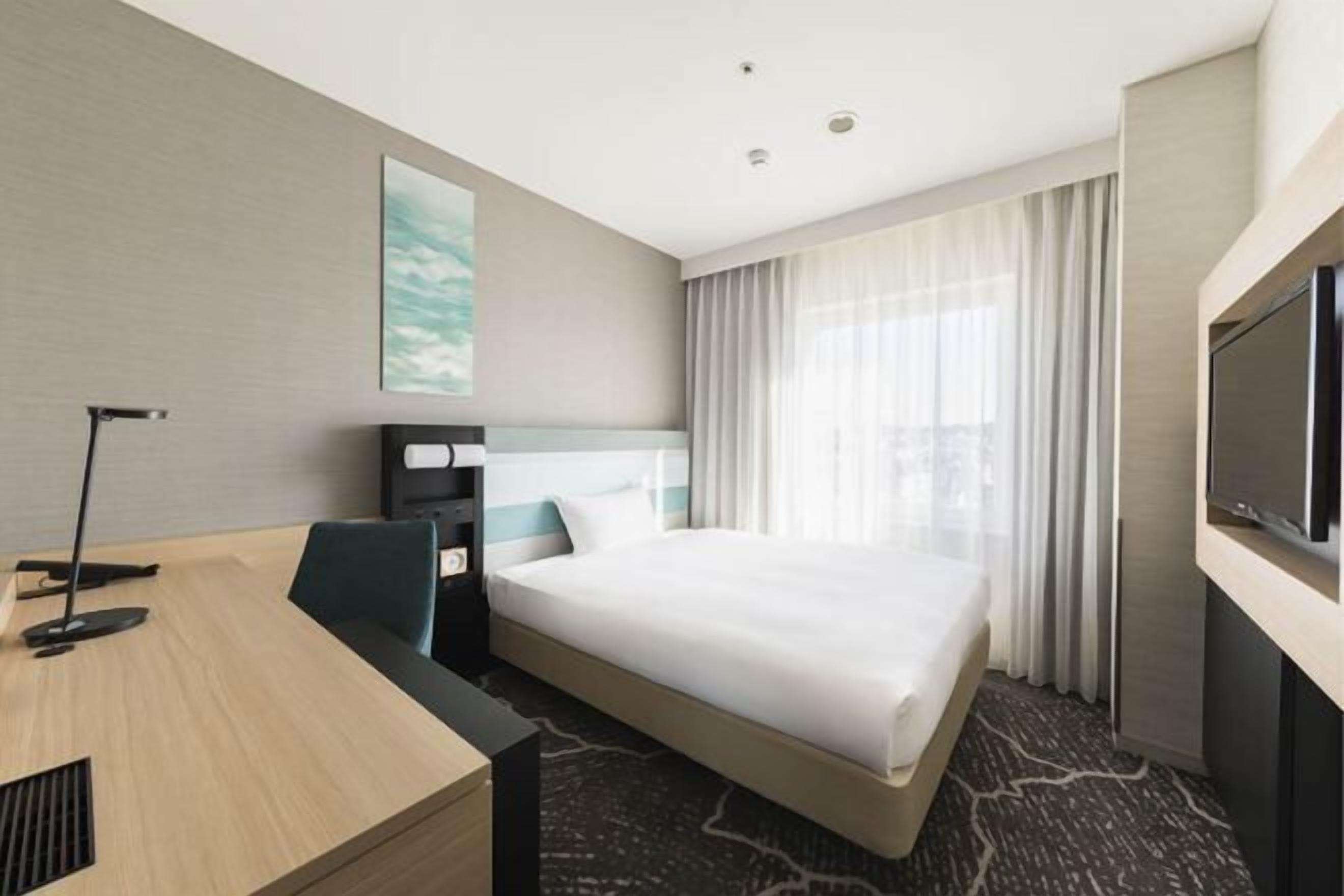 Premium bedding, desk, blackout drapes, iron/ironing board