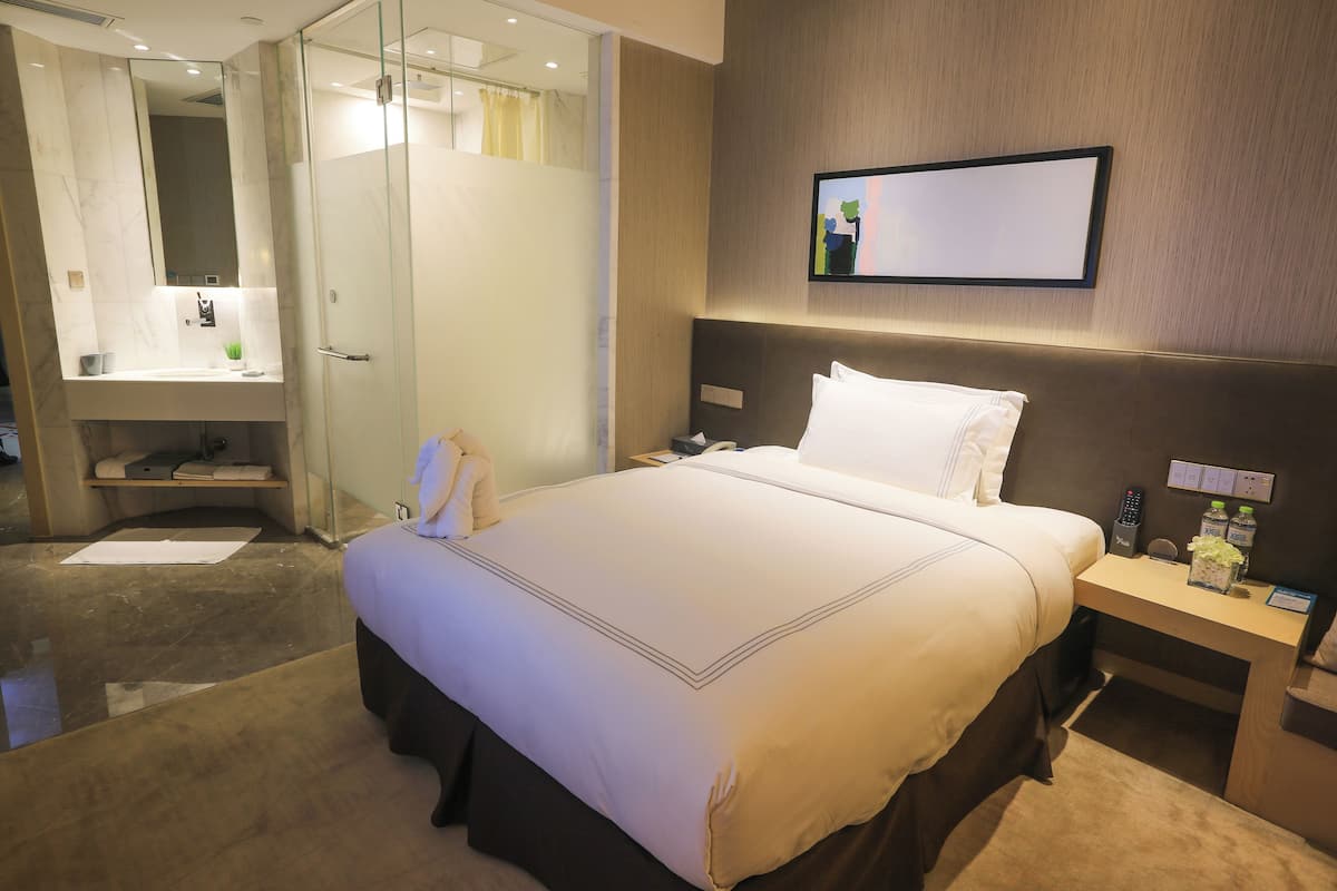 Superior tweepersoonskamer | Luxe beddengoed, donzen dekbedden, een minibar, een kluis op de kamer