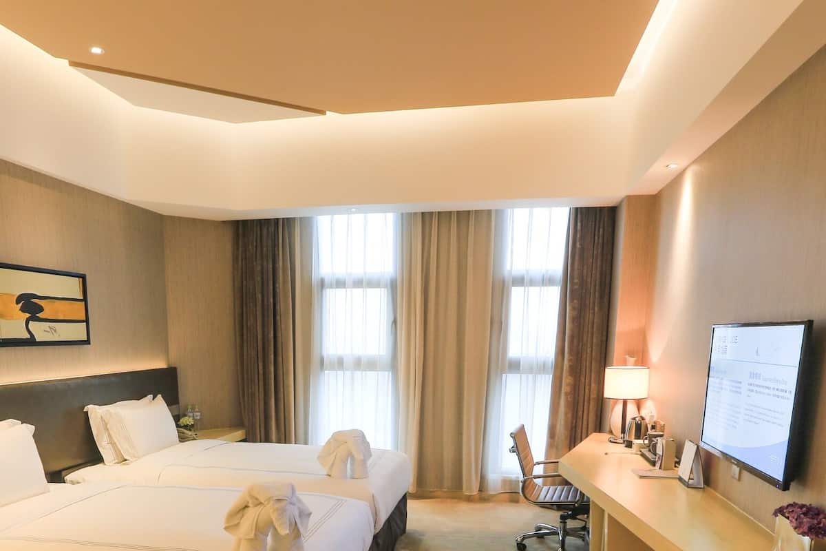 Superior Twin kamer | Luxe beddengoed, donzen dekbedden, een minibar, een kluis op de kamer