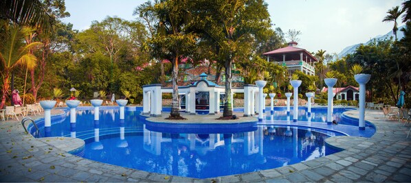 Outdoor pool, open 7:00 AM to 8:00 PM, lifeguards on site