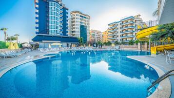 Outdoor pool, pool umbrellas, sun loungers