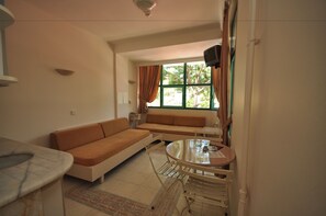 Apartment, 1 Bedroom | Living area | TV, fireplace - Club Atrium Marmaris (Marmaris)