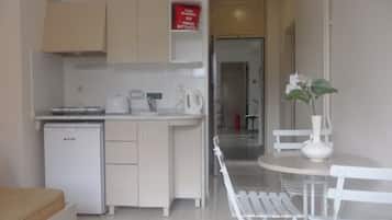 Apartment, 1 Bedroom | Living area | TV, fireplace