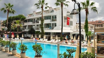 2 outdoor pools, open 8:00 AM to 8:00 PM, pool umbrellas, pool loungers