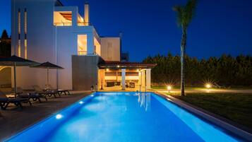 2 outdoor pools, pool umbrellas, pool loungers