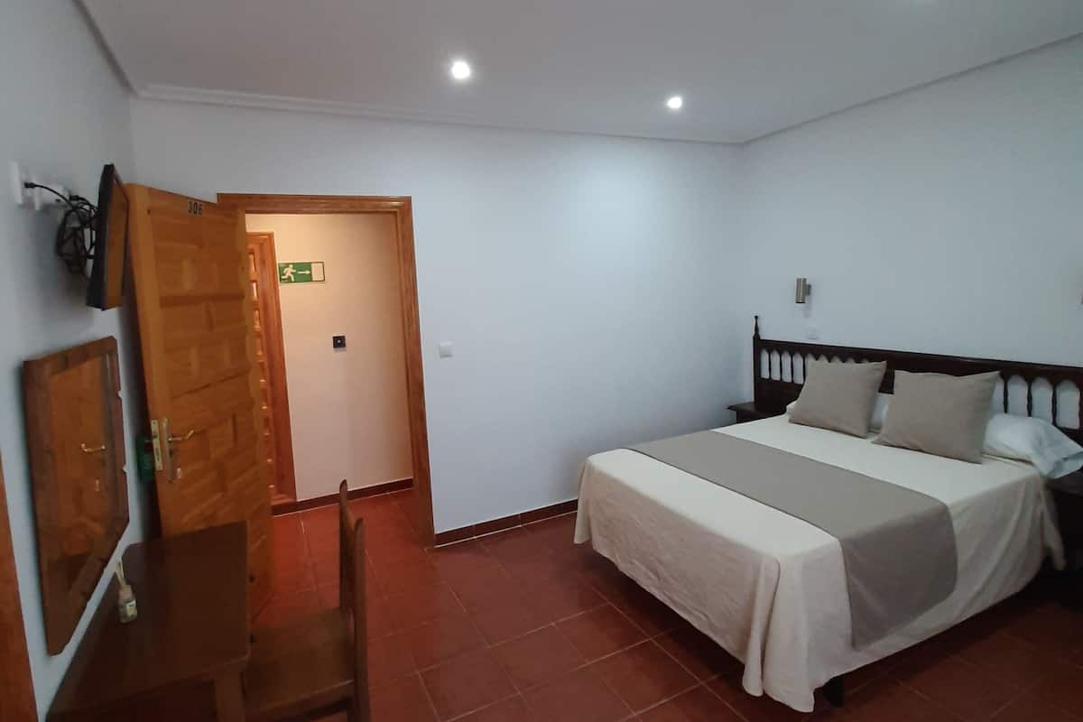 Desk, blackout drapes, free WiFi, bed sheets