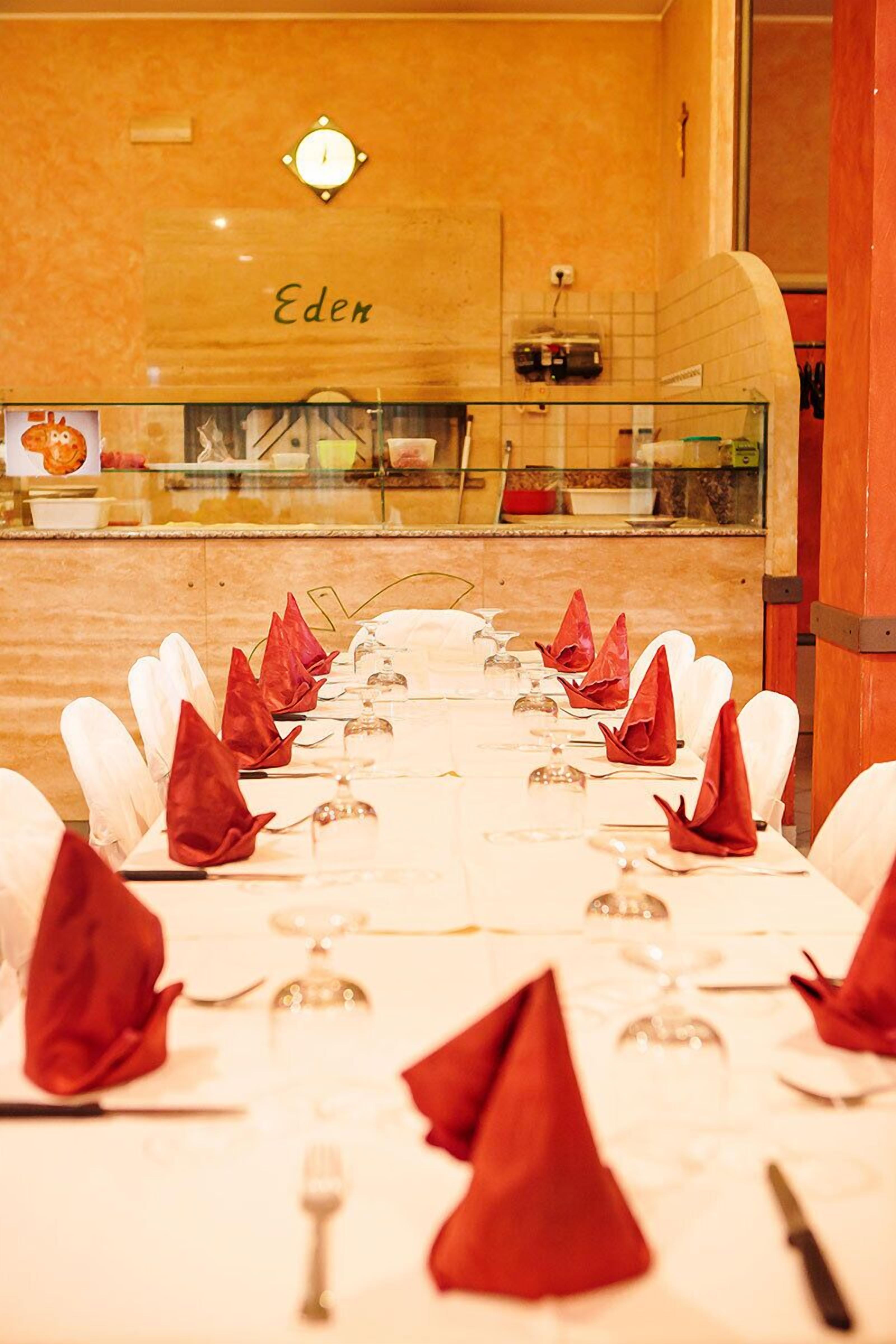 A conference room with a long table set for a meeting.