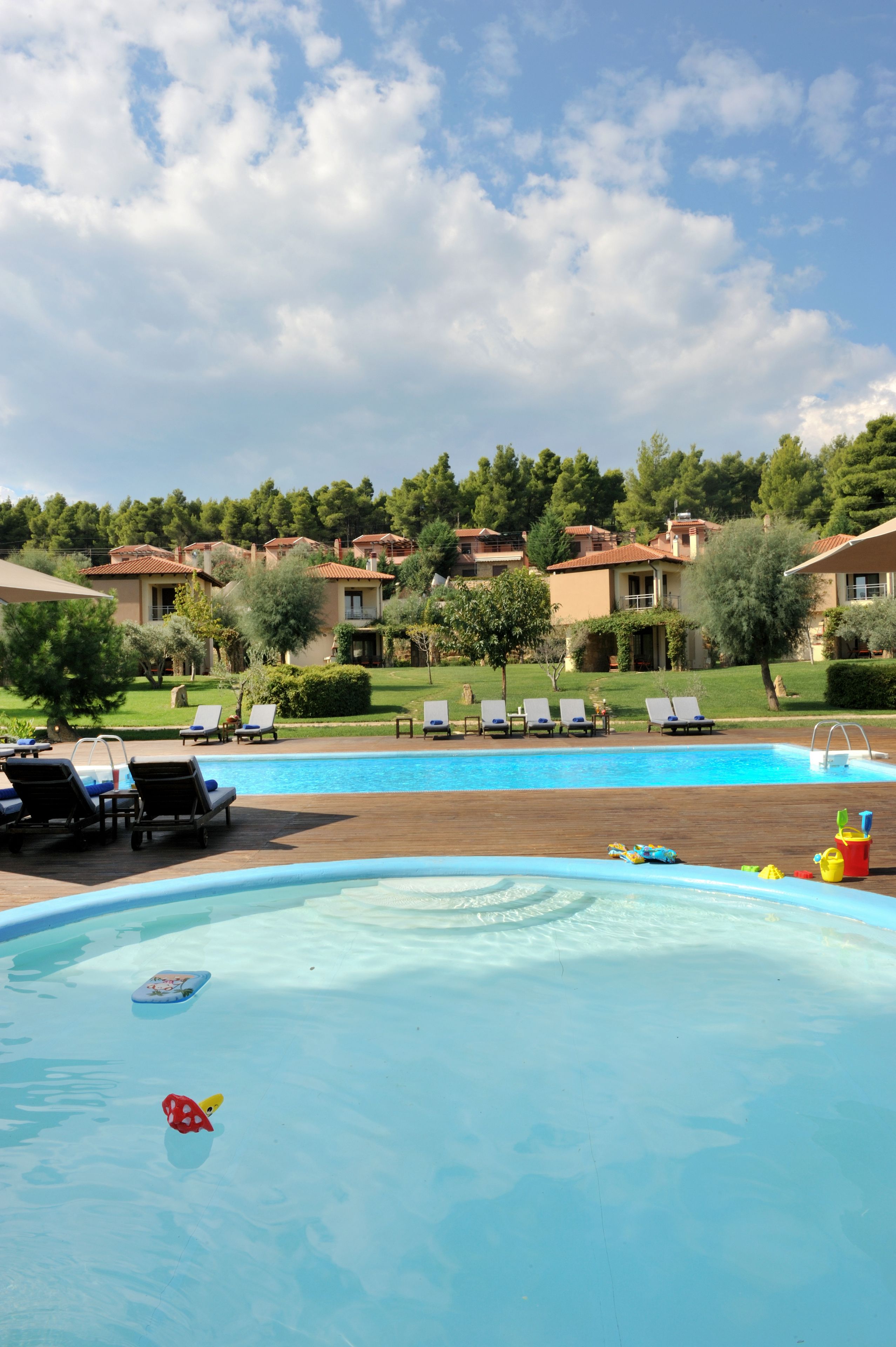 2 outdoor pools, pool umbrellas, pool loungers