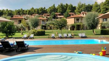 2 outdoor pools, pool umbrellas, pool loungers