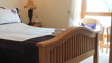 Premium bedding, desk, laptop workspace, free WiFi