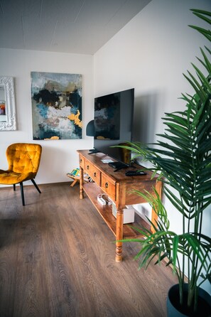 City Apartment, 3 Bedrooms | Living area - Apotek Guesthouse (Akureyri)