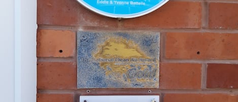 A heritage trail sign for the Blackpool Civic Trust, detailing the birthplace of Swallow Sidecars.
