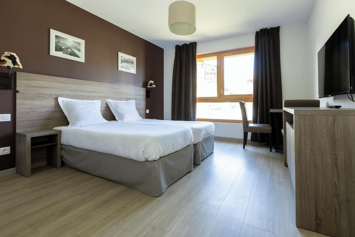 Apartamento superior | Sistema de insonorización, cunas gratuitas, wifi gratis y ropa de cama