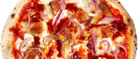 A pizza with toppings.