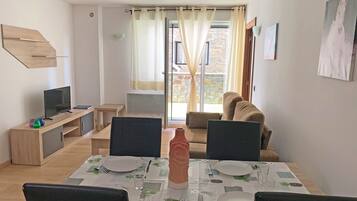 Comfort appartement, 1 slaapkamer | Woonruimte | Televisie