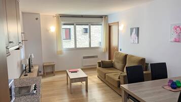 Apartment, 1 Bedroom | Living area | TV