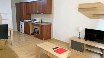 Familie appartement, 1 slaapkamer | Woonruimte | Televisie