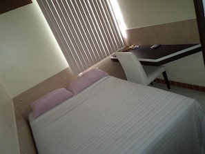 Single Room | Minibar, desk, blackout curtains, iron/ironing board