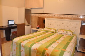 Double Room | Minibar, desk, blackout curtains, iron/ironing board