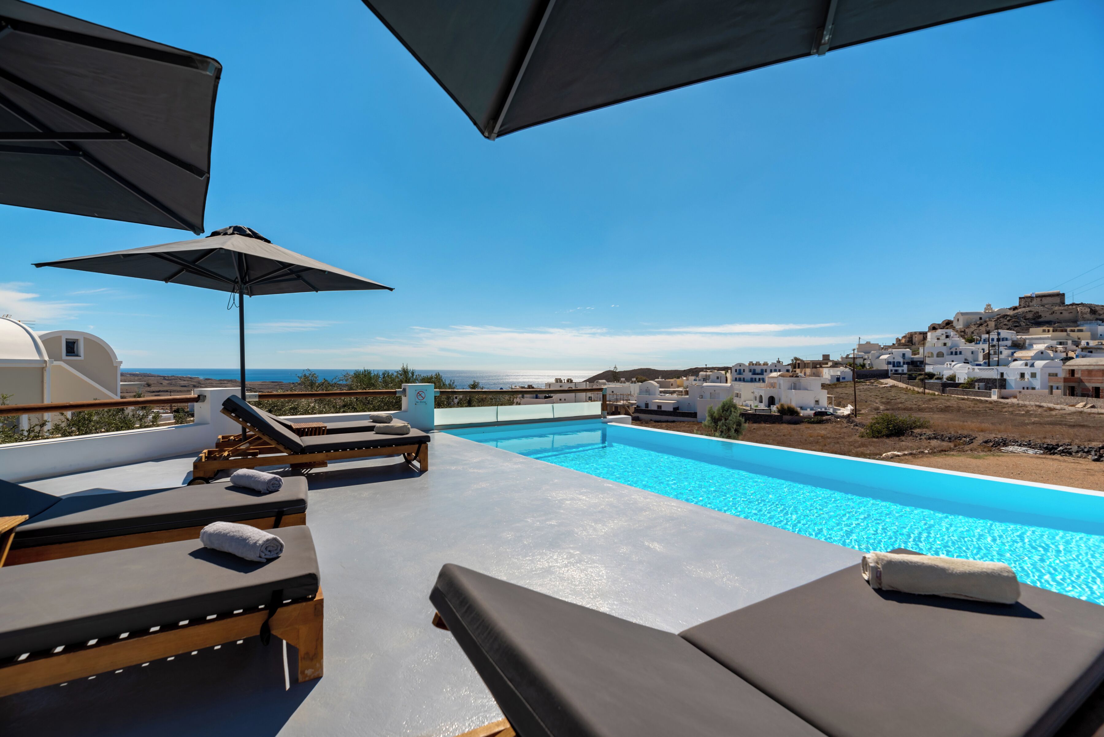Seasonal outdoor pool, pool umbrellas, pool loungers