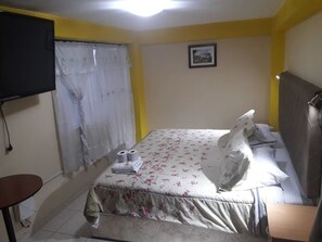 Habitación con 2 camas individuales | Camas extra y wifi gratis 