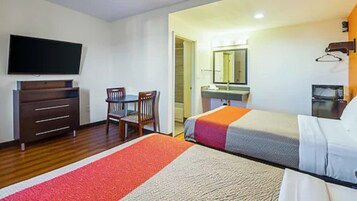 Tabla de planchar con plancha, wifi gratis y ropa de cama 