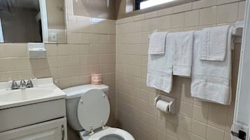 Basic Double or Twin Room, 2 Bedrooms, Smoking | Bathroom | Shower, towels, soap, shampoo