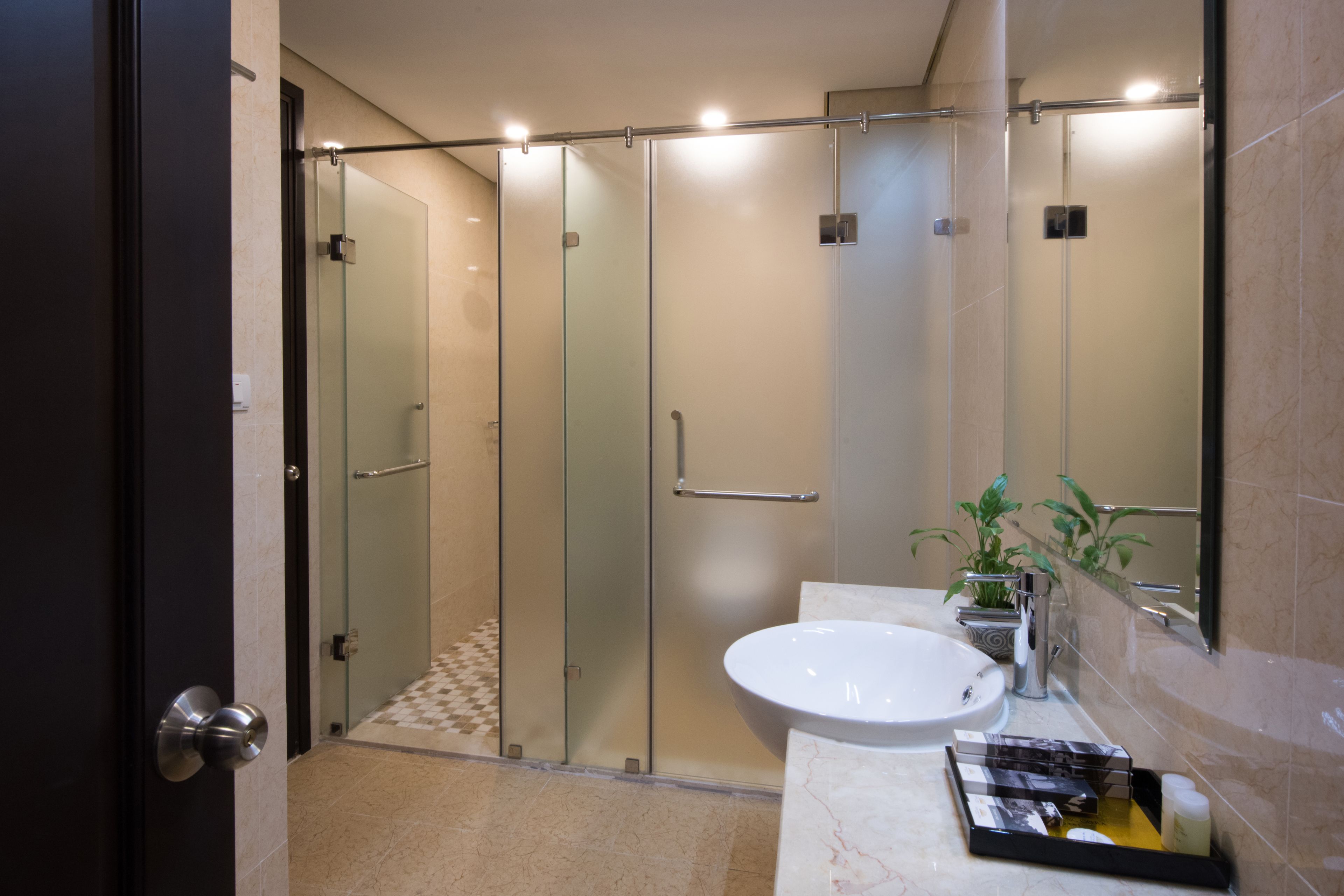 family suite, 2 bedrooms, connecting rooms, city view | bathroom | rainfall showerhead, designer toiletries, hair dryer, slippers