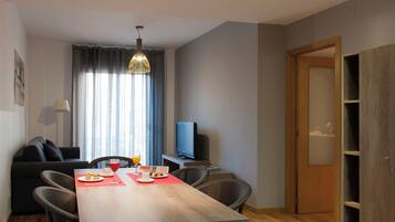 Standard Apartment, 3 Bedrooms | Living area | 32-inch flat-screen TV with satellite channels, TV