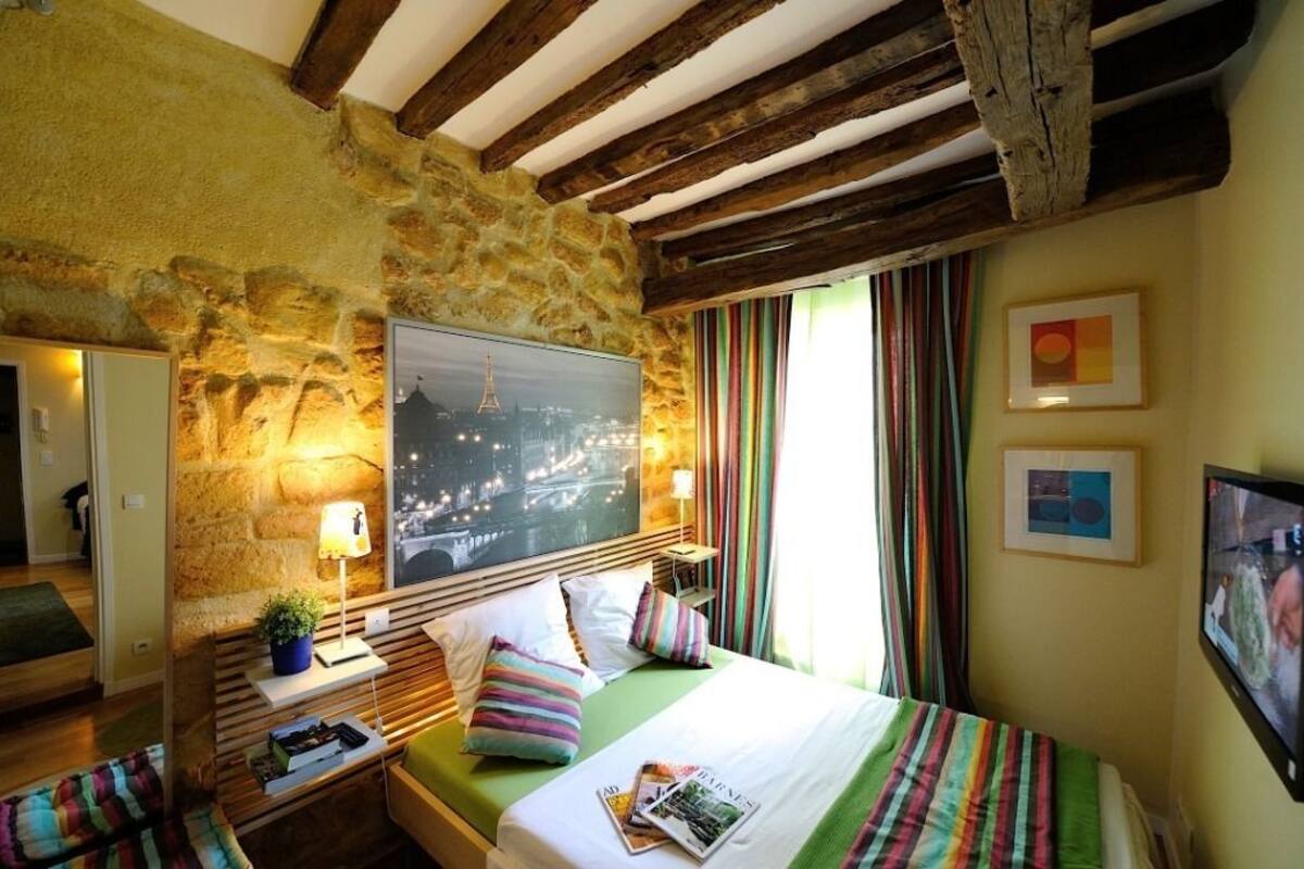 Apartment, 1 Bedroom (Honeymoon) | In-room safe, iron/ironing board, cribs (free), WiFi (free)