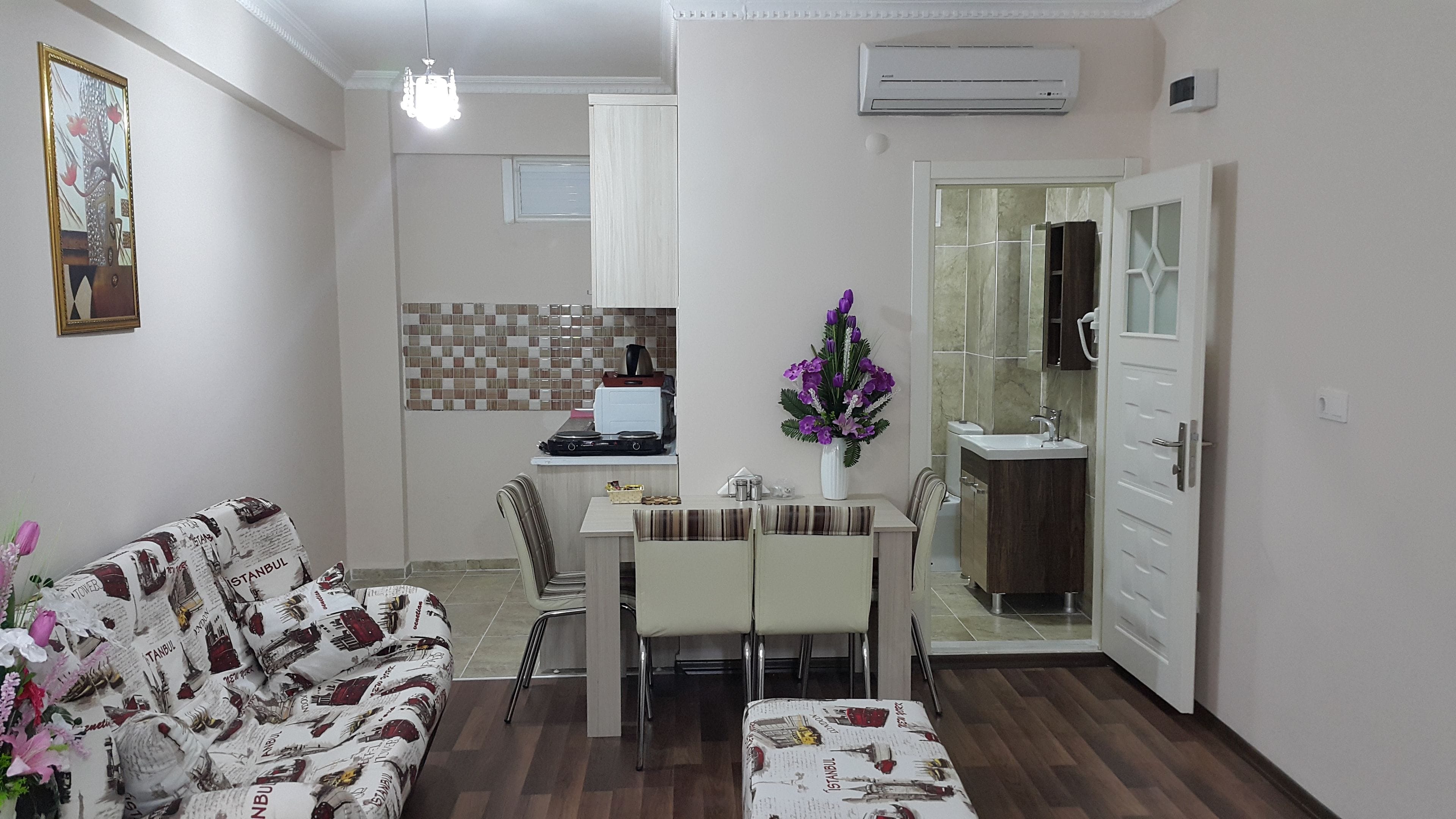Family Studio | Living area | Flat-screen TV