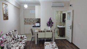 Estudi familiar | Sala d'estar | Televisor de pantalla plana 