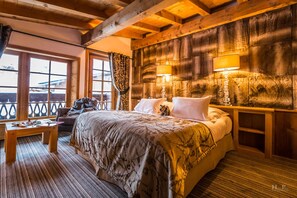 Familiesuite | Sengetøy av topp kvalitet, minibar og safe på rommet