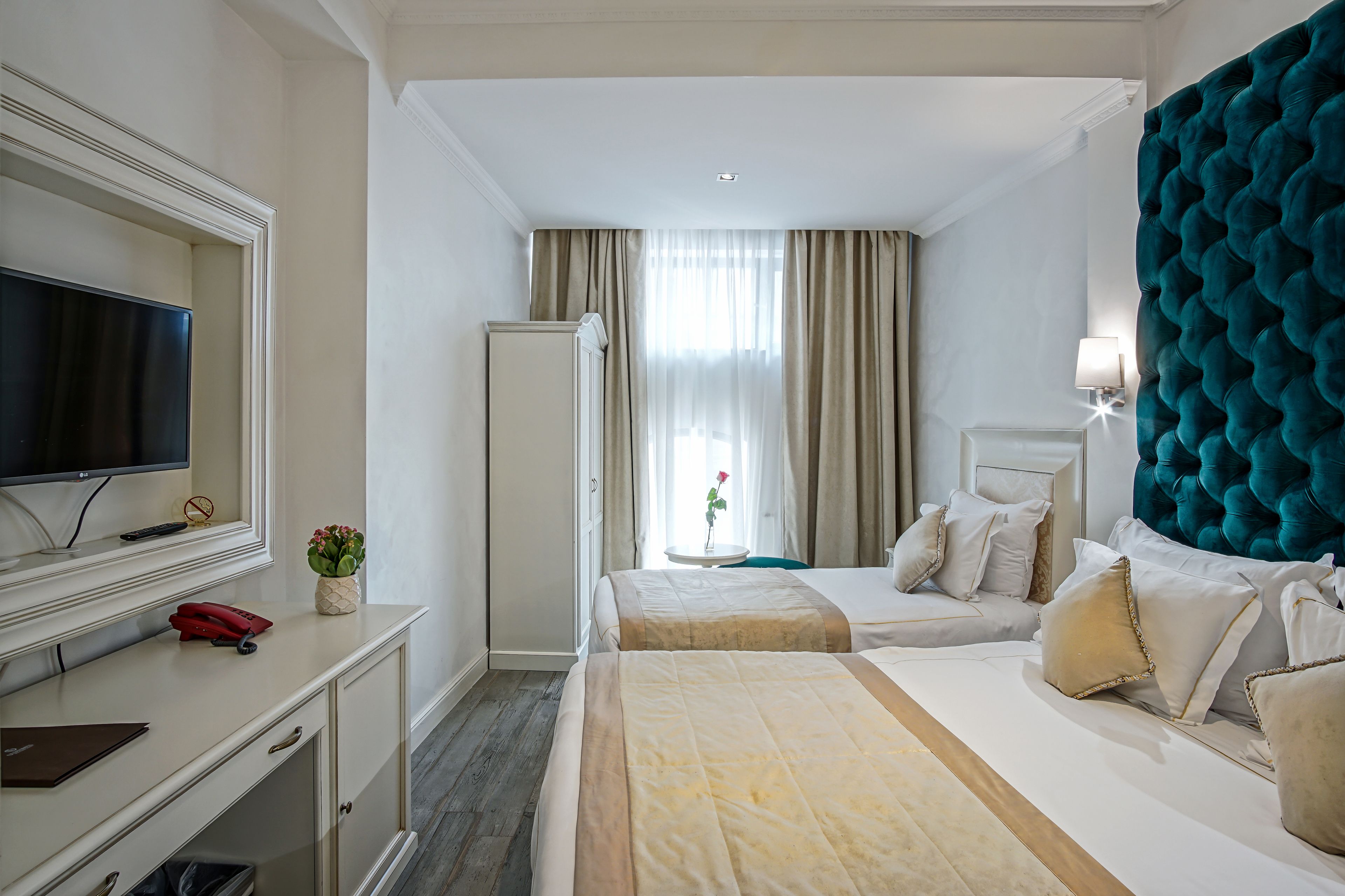 twin room | premium bedding, minibar, in-room safe, desk