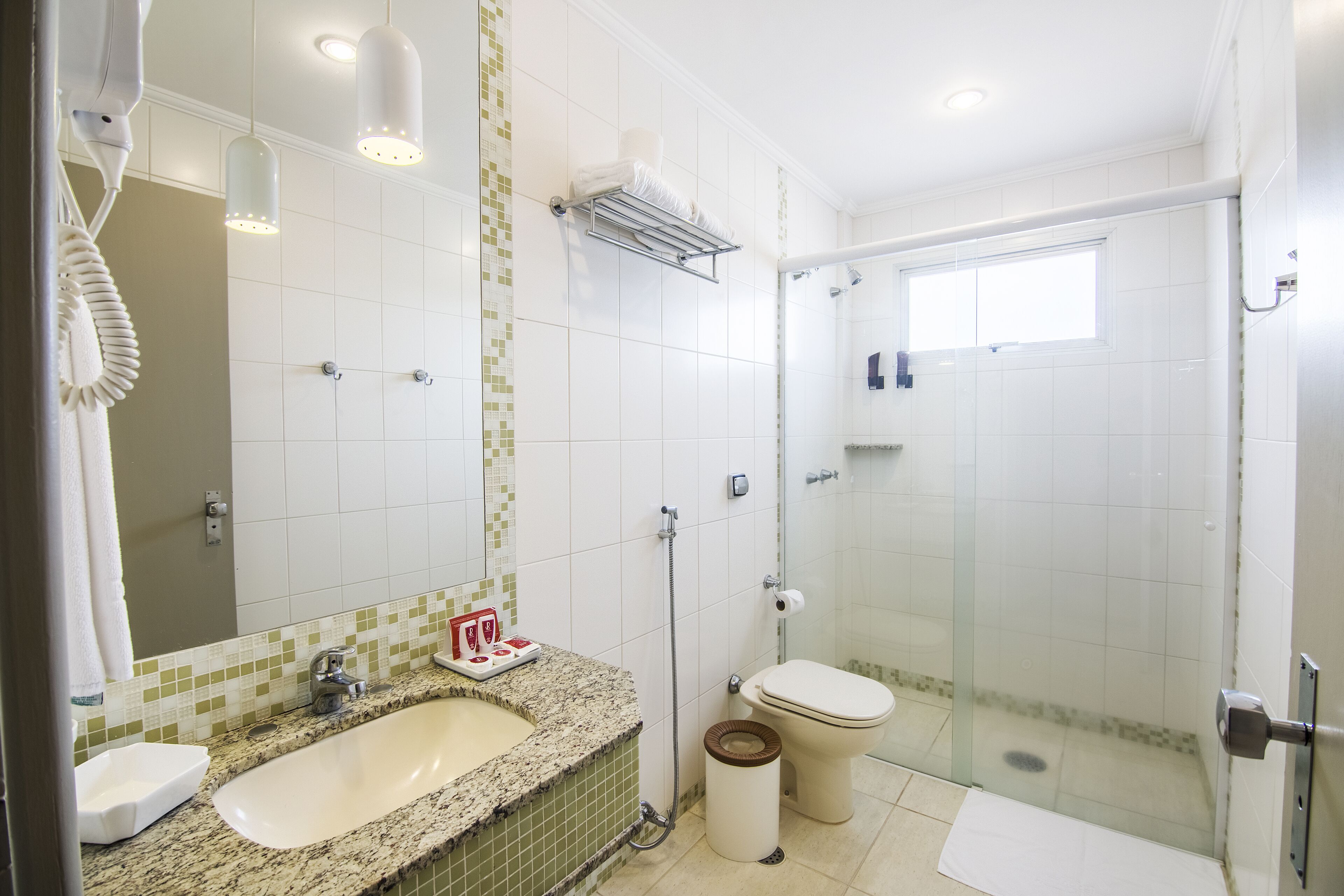 shower, free toiletries, hair dryer, towels