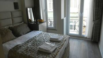 Premium bedding, minibar, desk, soundproofing